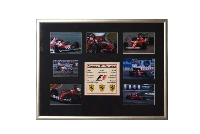 Kehystetty Ferrarin F1 kuskien aidot nimikirjoitukset